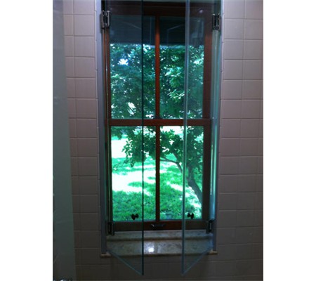 Bath & Shower- Glass doors over shower window.